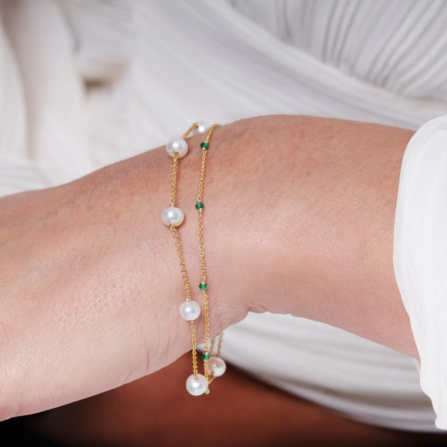 Credo fine double chain bracelet with cultured freshwater pearls & emerald