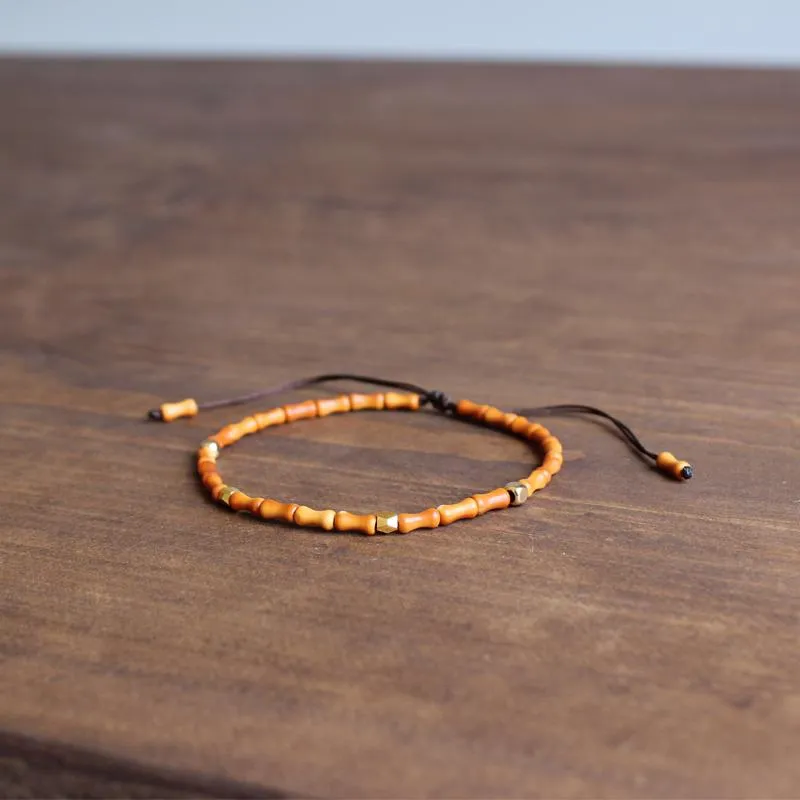 Hand-Carved Natural Olive Nut &amp 24K Gold Bracelet